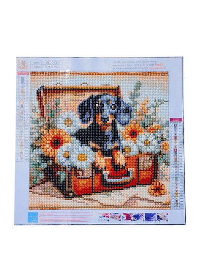 Finished Diamond Painting - Dachshund Puppy in Suitcase with Flowers